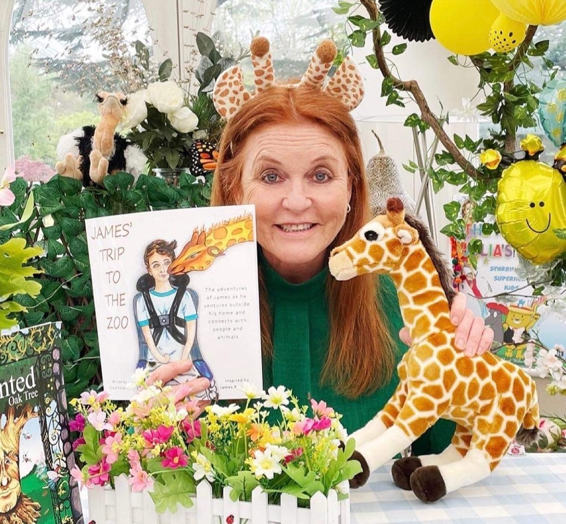 Sarah Ferguson holding children's book James Trip to the Zoo which is designed to inspire and educate people to be inclusive
